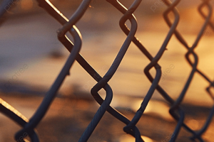 pngtree-wire-mesh-fence-with-blurred-background-of-concrete-floor-image_15904472-1.png
